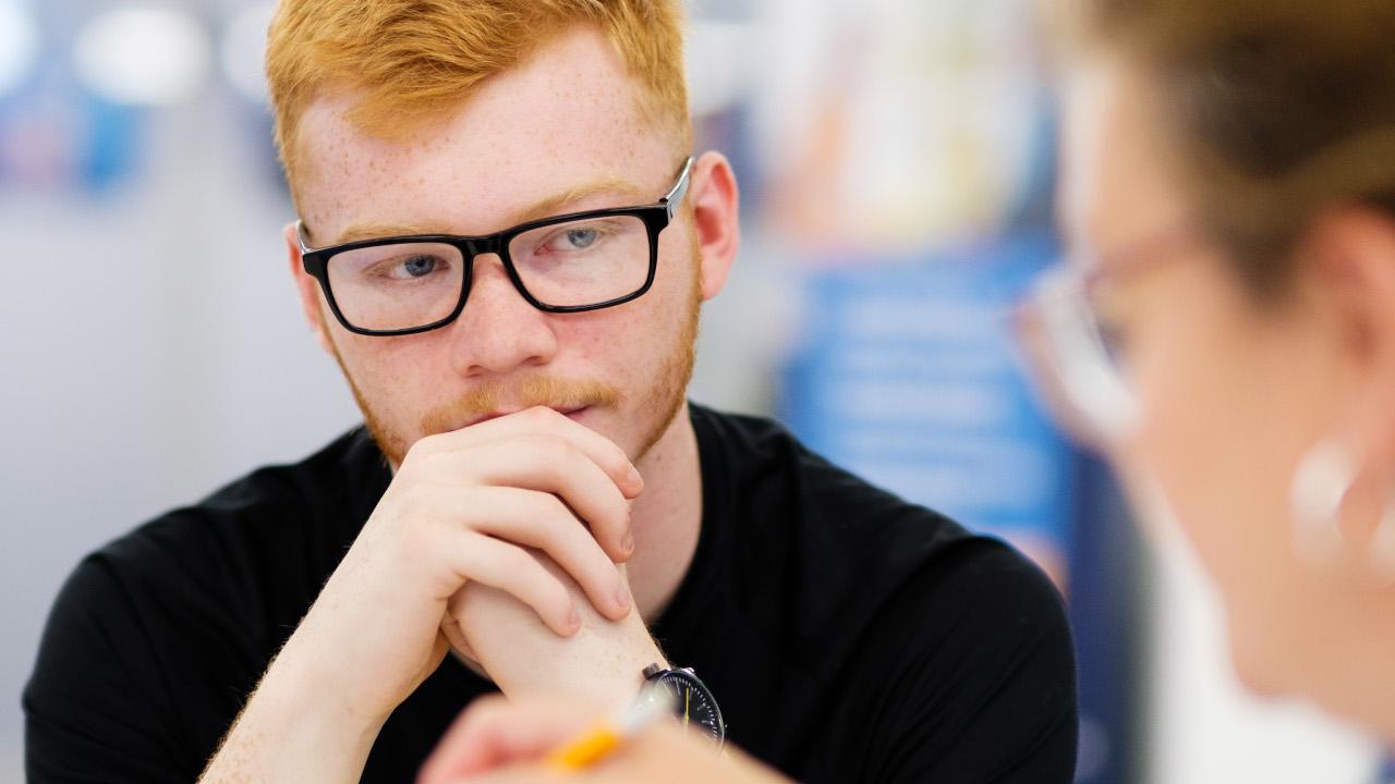 Young person having a conversation